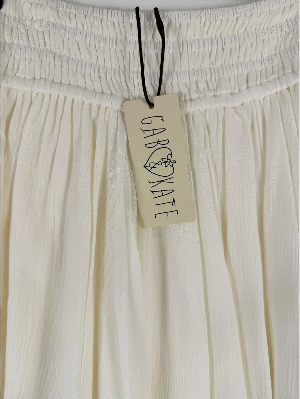 Gab & Kate Skylar White Smocked Waist Mini Skirt‎ Ruffle Hem Flowy Size Small